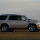 Illustration for article titled 1,000-HP Twin-Turbo Escalade beats Nissan GT-R
